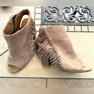 Sugar heel bootie with fringe.
